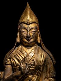 A Tibetan Gilt Bronze Repoussé Seated Figure of Tsongkhapa
