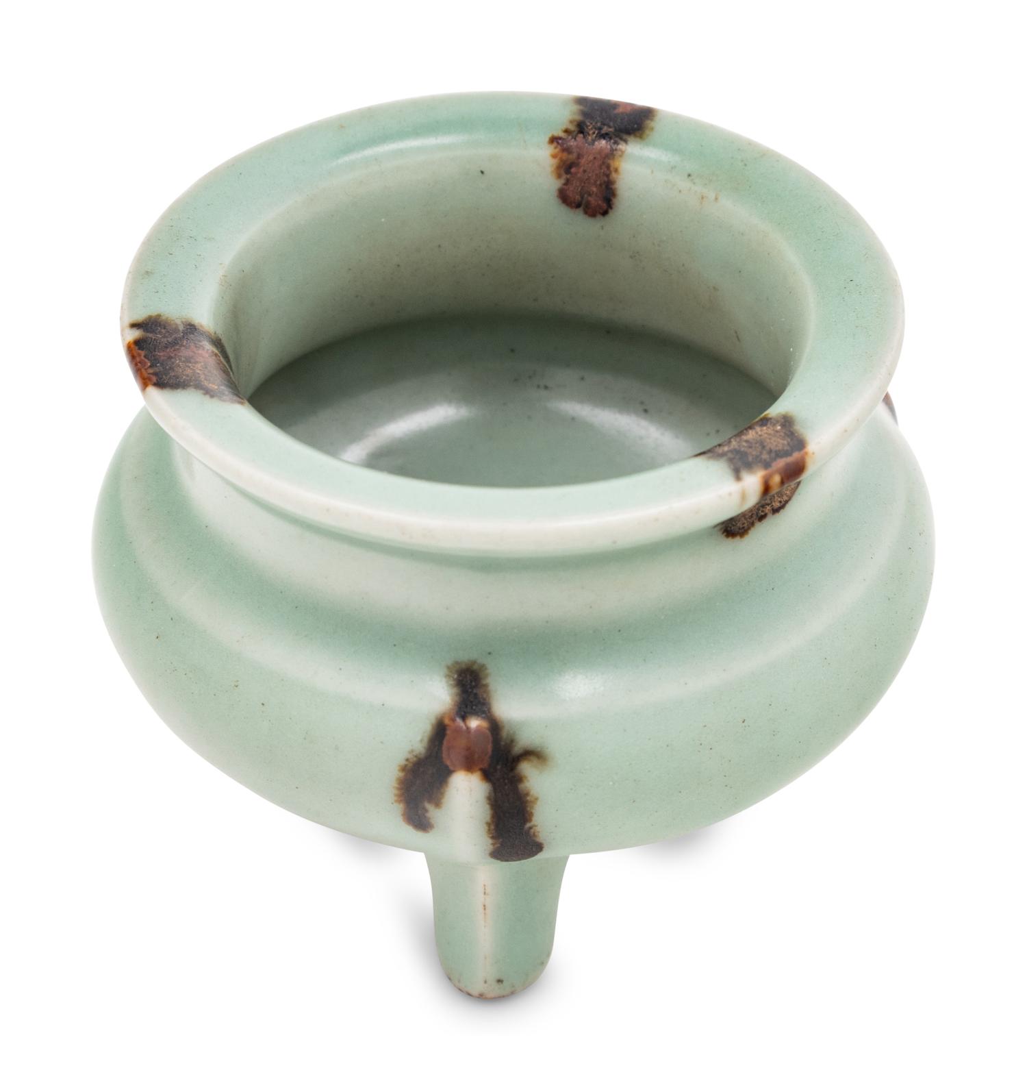 A Chinese Longquan Tobi Seiji Glazed Tripod Incense Burner
