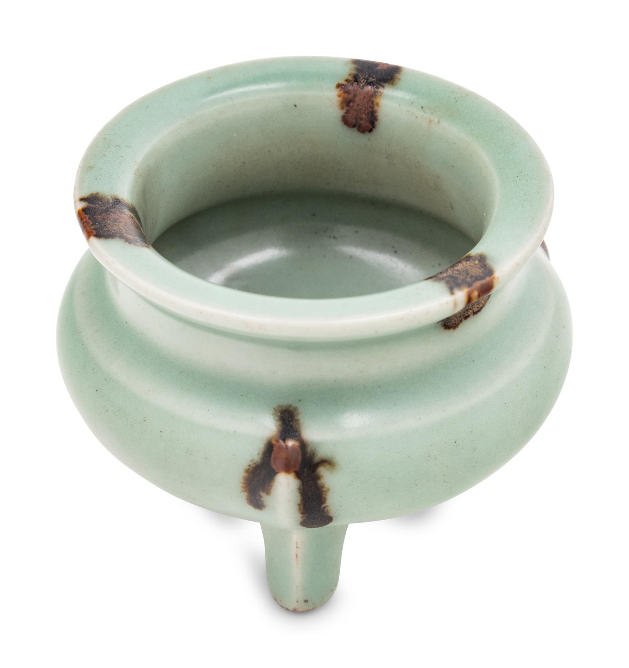 A Chinese Longquan Tobi Seiji Glazed Tripod Incense Burner