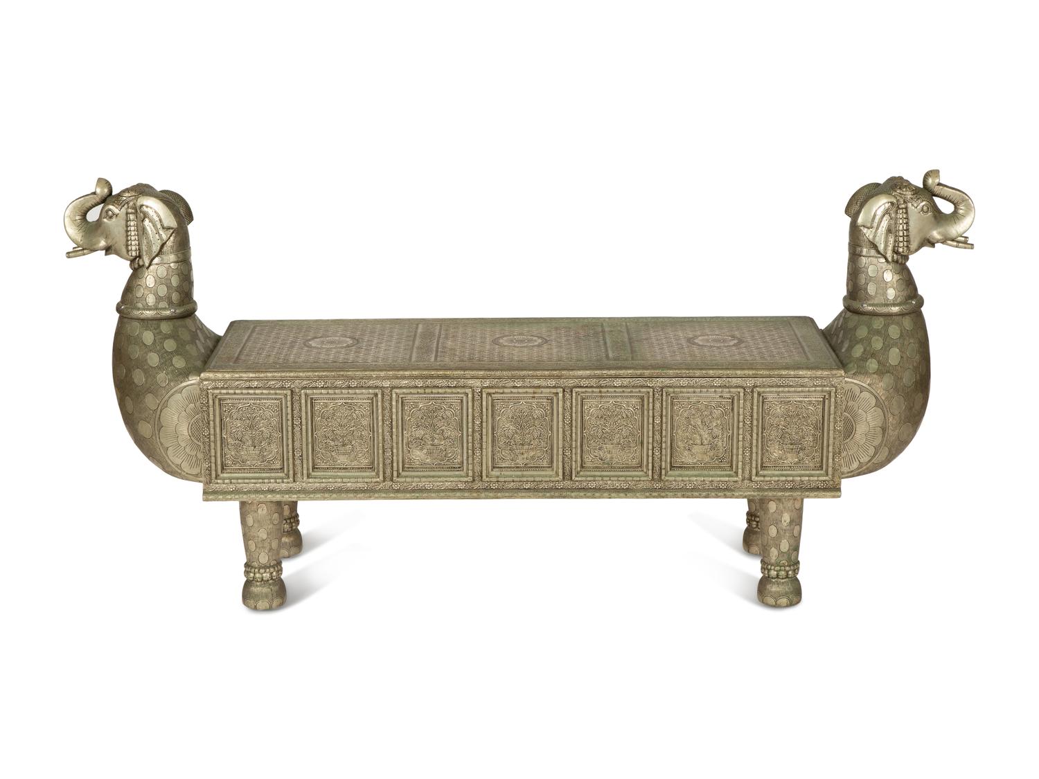 A South-East Asian Pressed Metal Bench with Elephant Form Ends — 20th Century