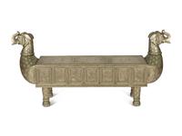 A South-East Asian Pressed Metal Bench with Elephant Form Ends — 20th Century