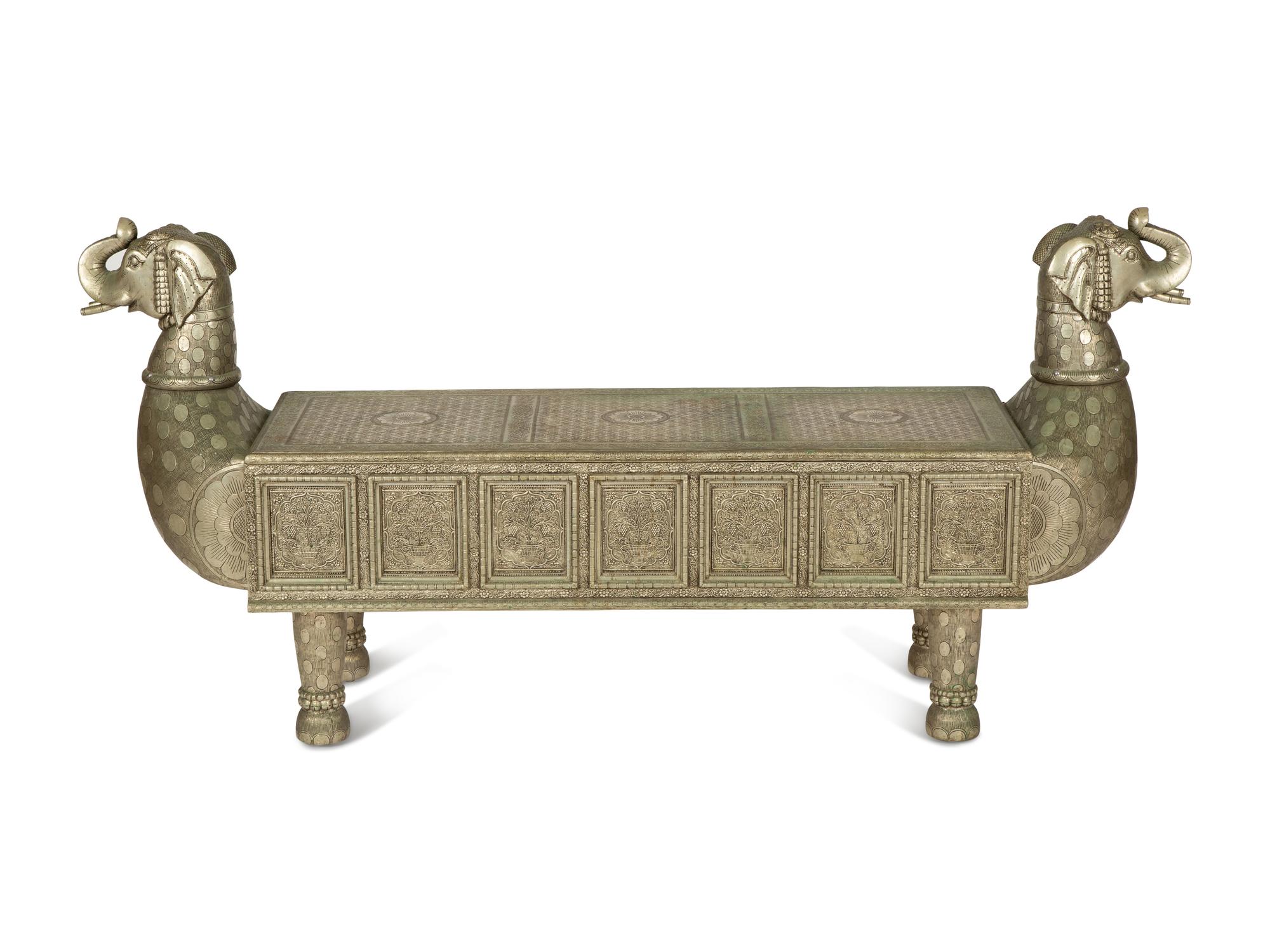 A South-East Asian Pressed Metal Bench with Elephant Form Ends — 20th Century