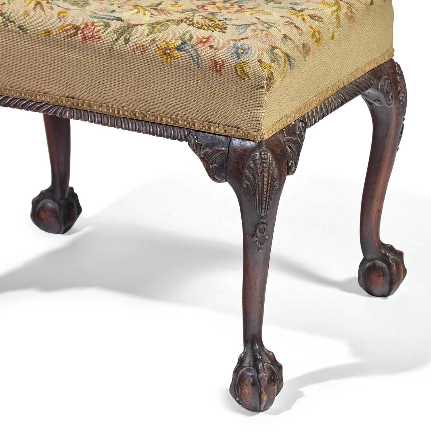 A George III Style Carved Mahogany Stool with Needlepoint Upholstery