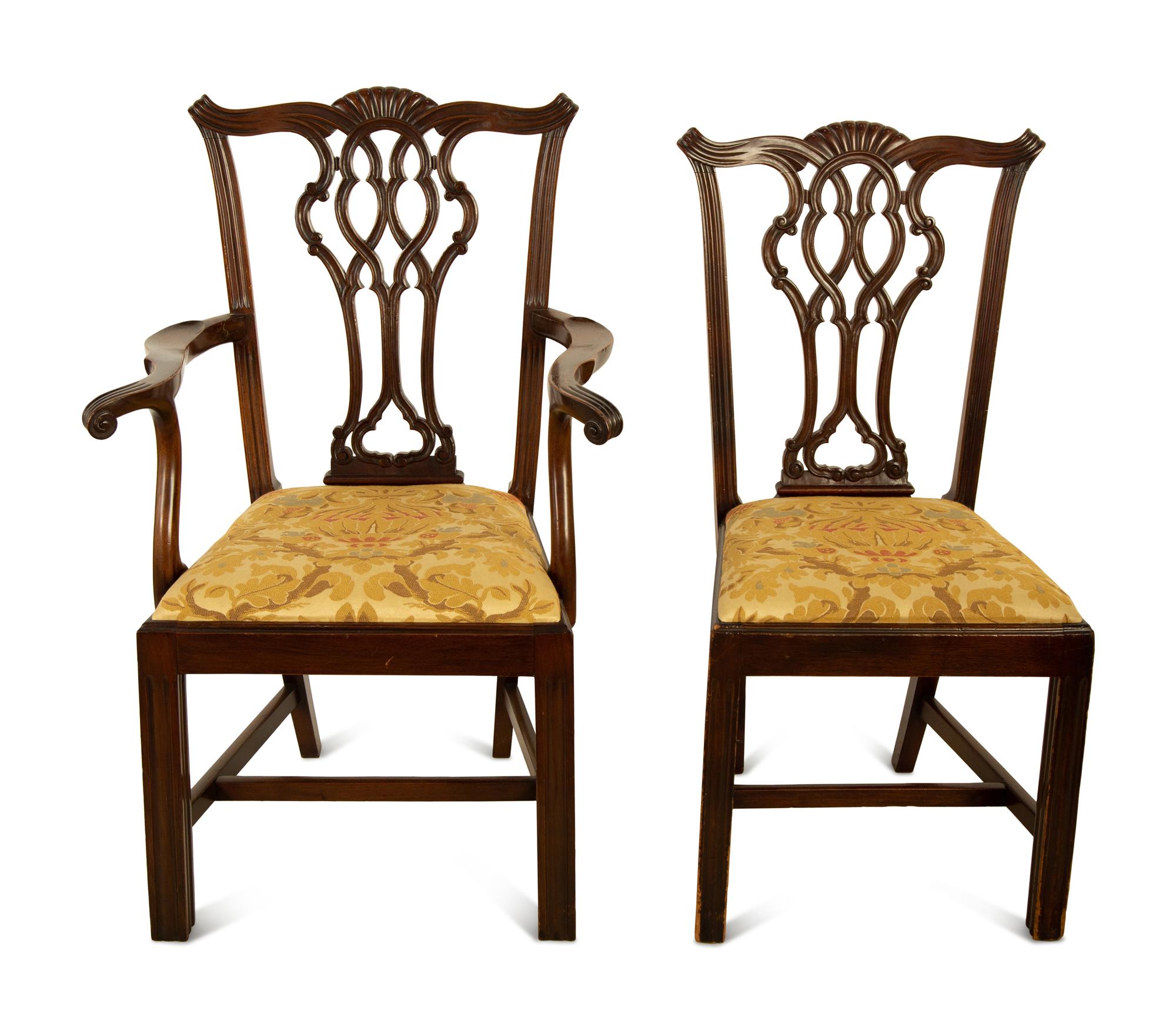 A Set of Fourteen George III Style Mahogany Dining Chairs