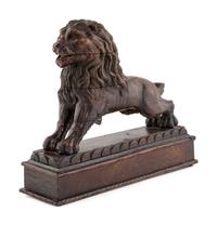 A Continental Carved Oak Lion