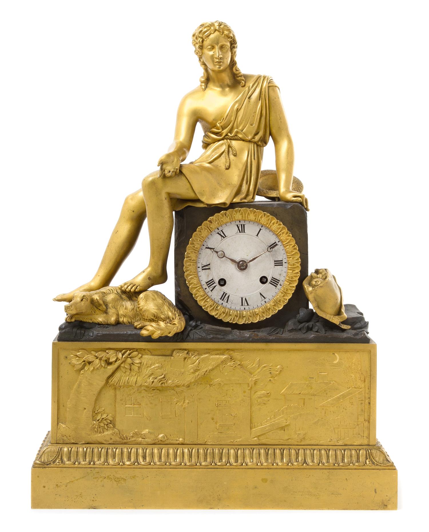 An Empire Gilt and Patinated Bronze Mantel Clock Height 16 1/4 inches. — EARLY 19TH CENTURY