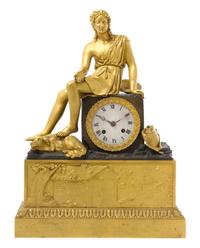 An Empire Gilt and Patinated Bronze Mantel Clock Height 16 1/4 inches. — EARLY 19TH CENTURY
