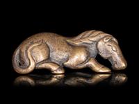 A Chinese Gilt Bronze Figure of a Recumbent Horse