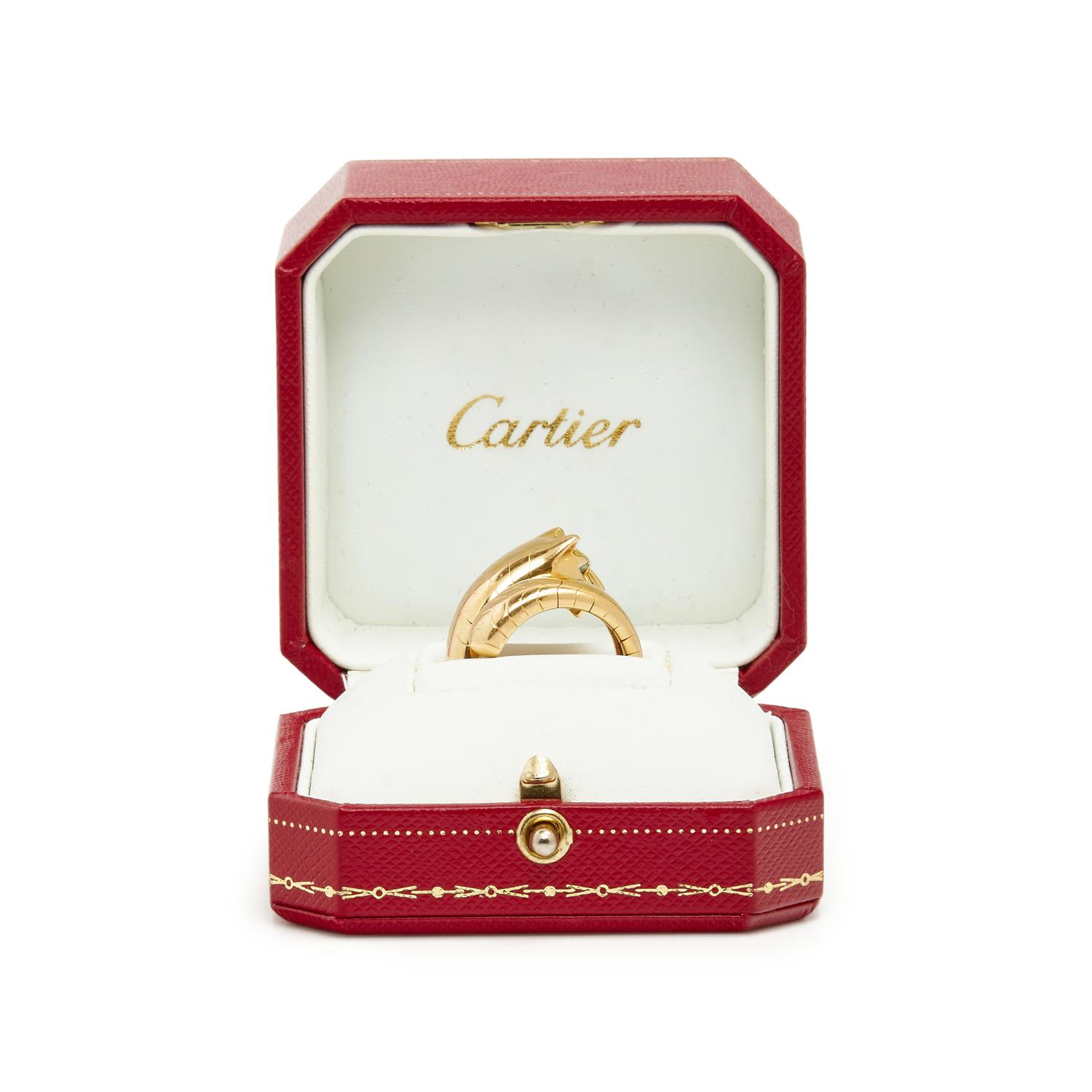 CARTIER, YELLOW GOLD, EMERALD AND ONYX 'PANTHERE' RING