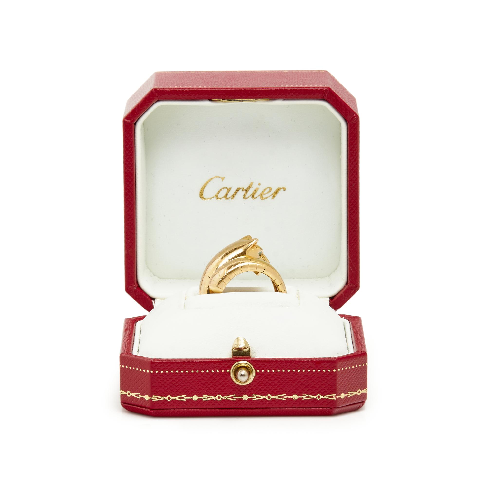 CARTIER, YELLOW GOLD, EMERALD AND ONYX 'PANTHERE' RING