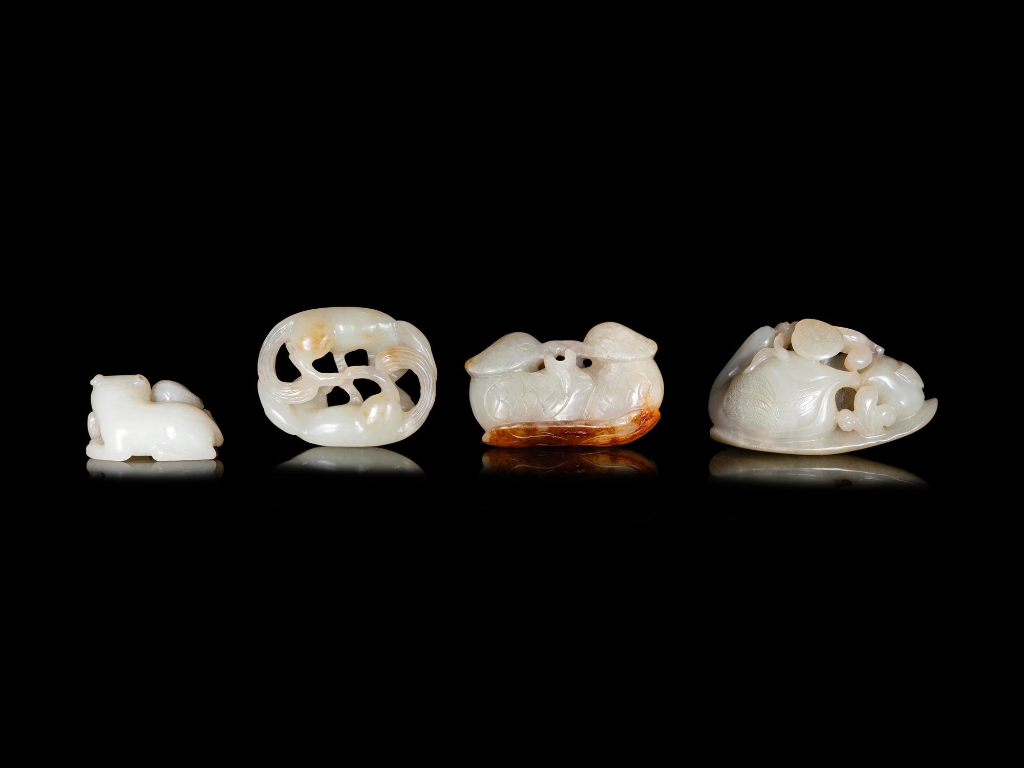 Four Chinese Carved Celadon Jade Figures