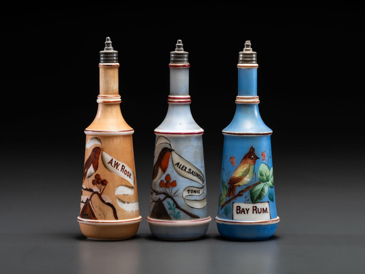 Three Paint Decorated Barber Bottles