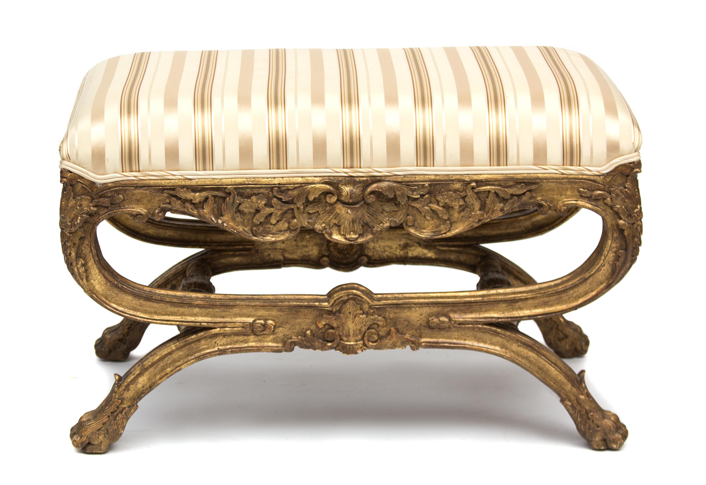 An Italian Rococo Style Painted and Parcel Gilt Curule-Form Tabouret Height 20 x width 31 x depth 17 inches. — EARLY 20TH CENTURY