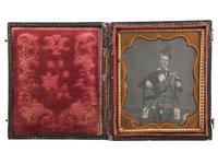 [EARLY PHOTOGRAPHY]. A sixth plate daguerreotype portrait of a man wearing Scottish garb.