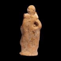 A Greek Terracotta Eros Holding a Club