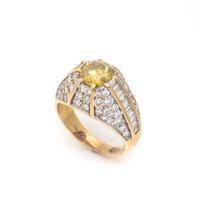 TREATED FANCY VIVID YELLOW DIAMOND AND DIAMOND RING