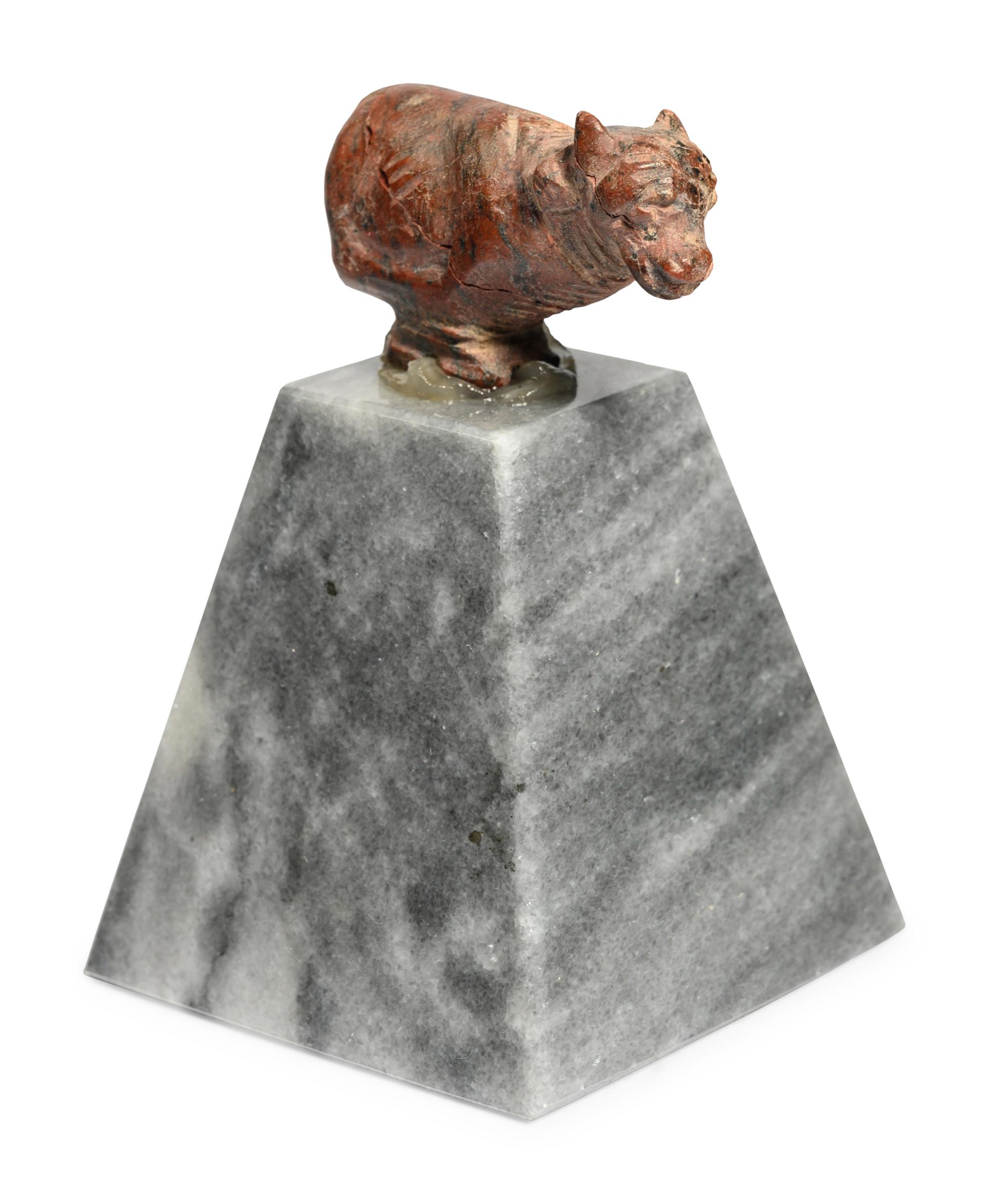An Egyptian Red Jasper Trussed Cow