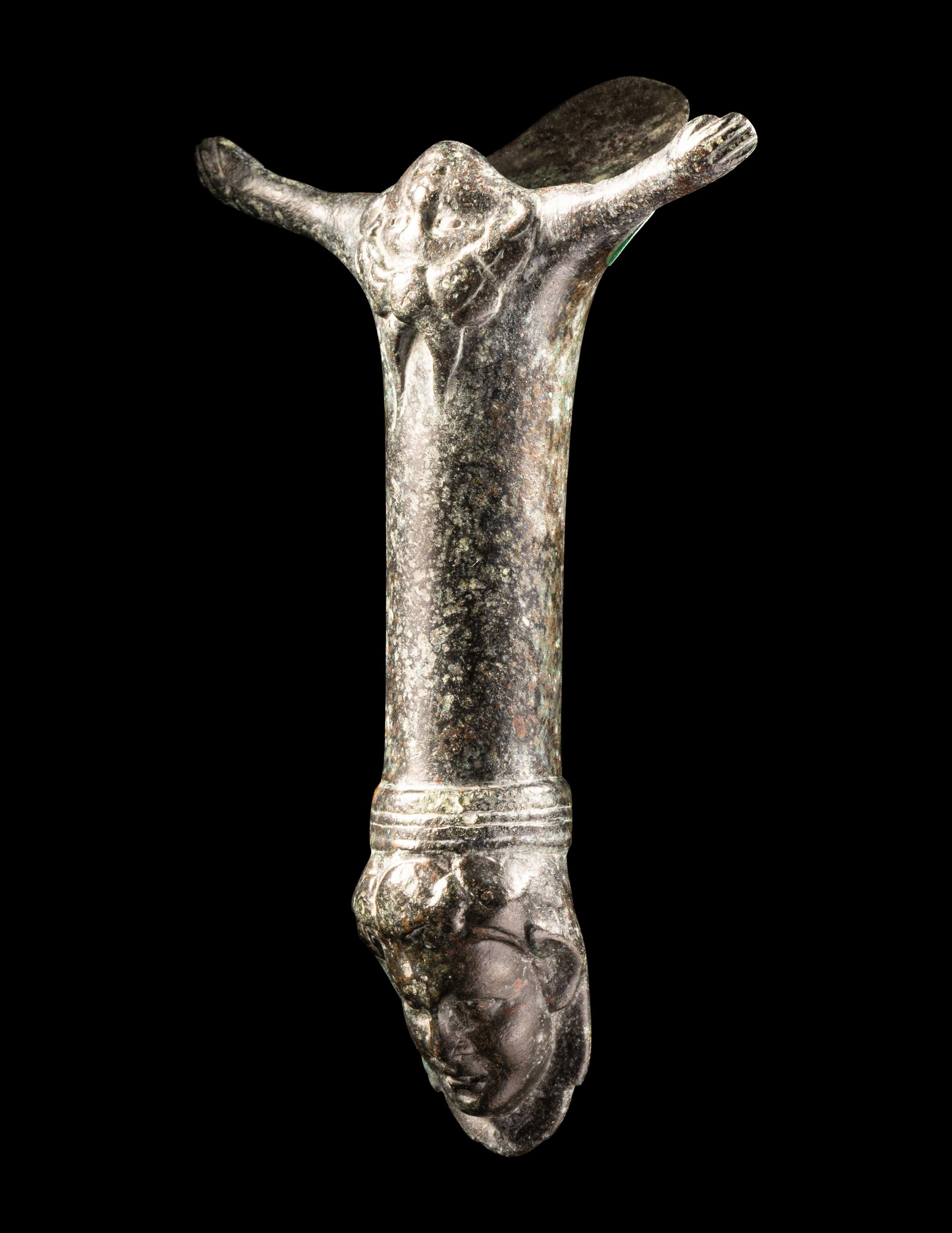 A Roman Bronze Patera Handle