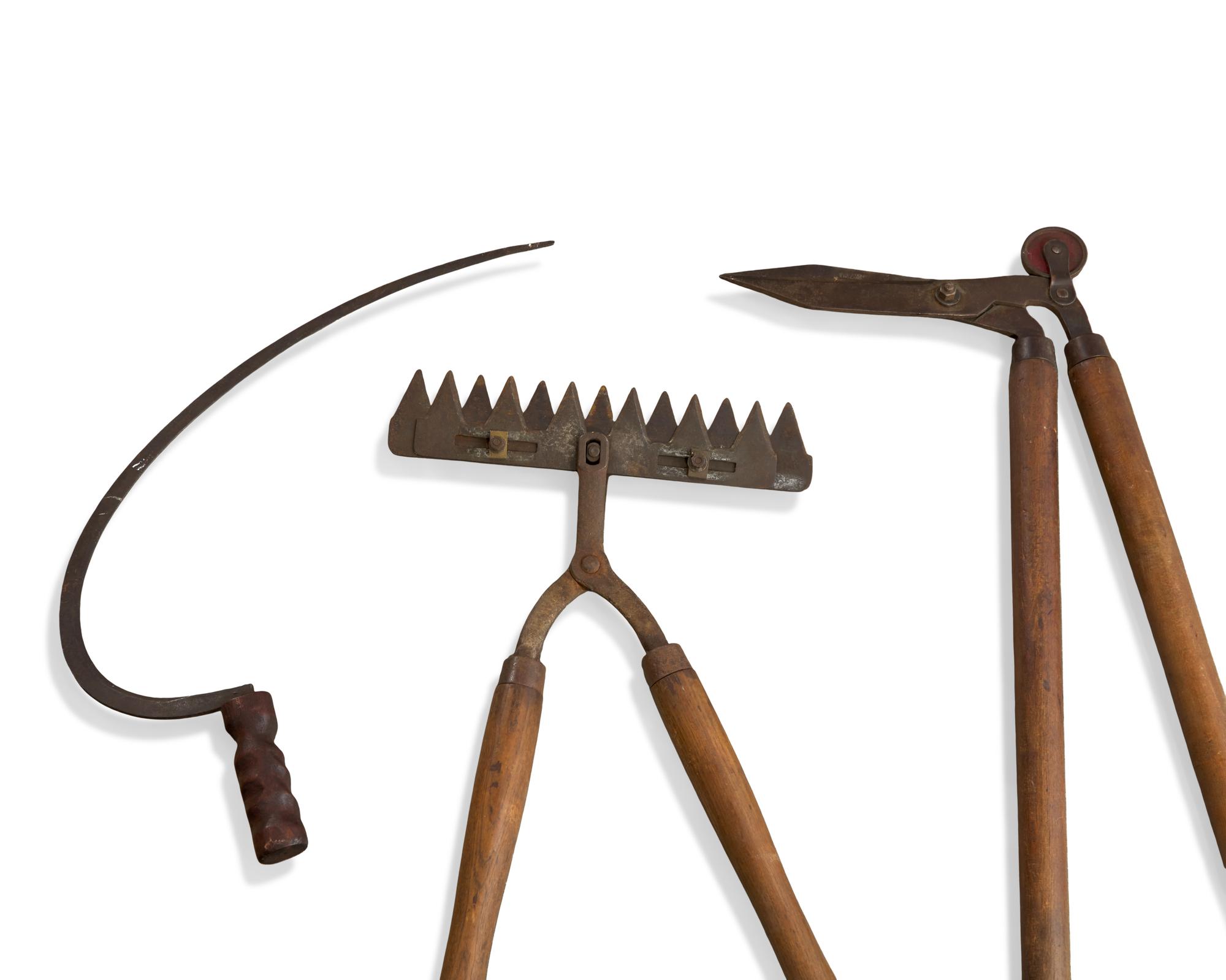 An Assorted Collection of Thirty-One Metal and Wood Garden Tools