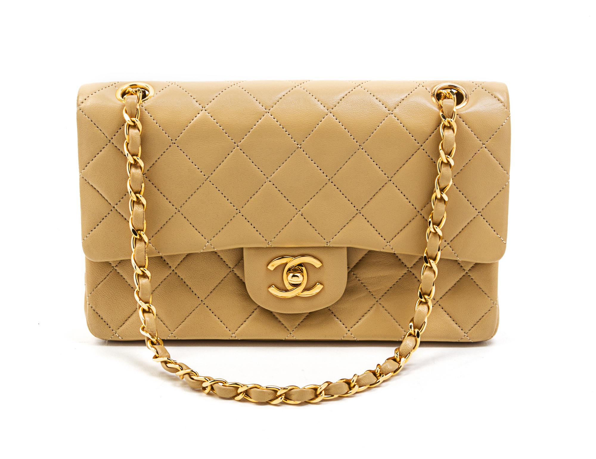 A Chanel Black Chevron Quilted Suede Convertible Bag, 9 x 5 1/2 x 1 inches.