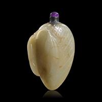 A Chinese Carved Celadon Jade "Lychee Fruit" Snuff Bottle, 18th/19th century