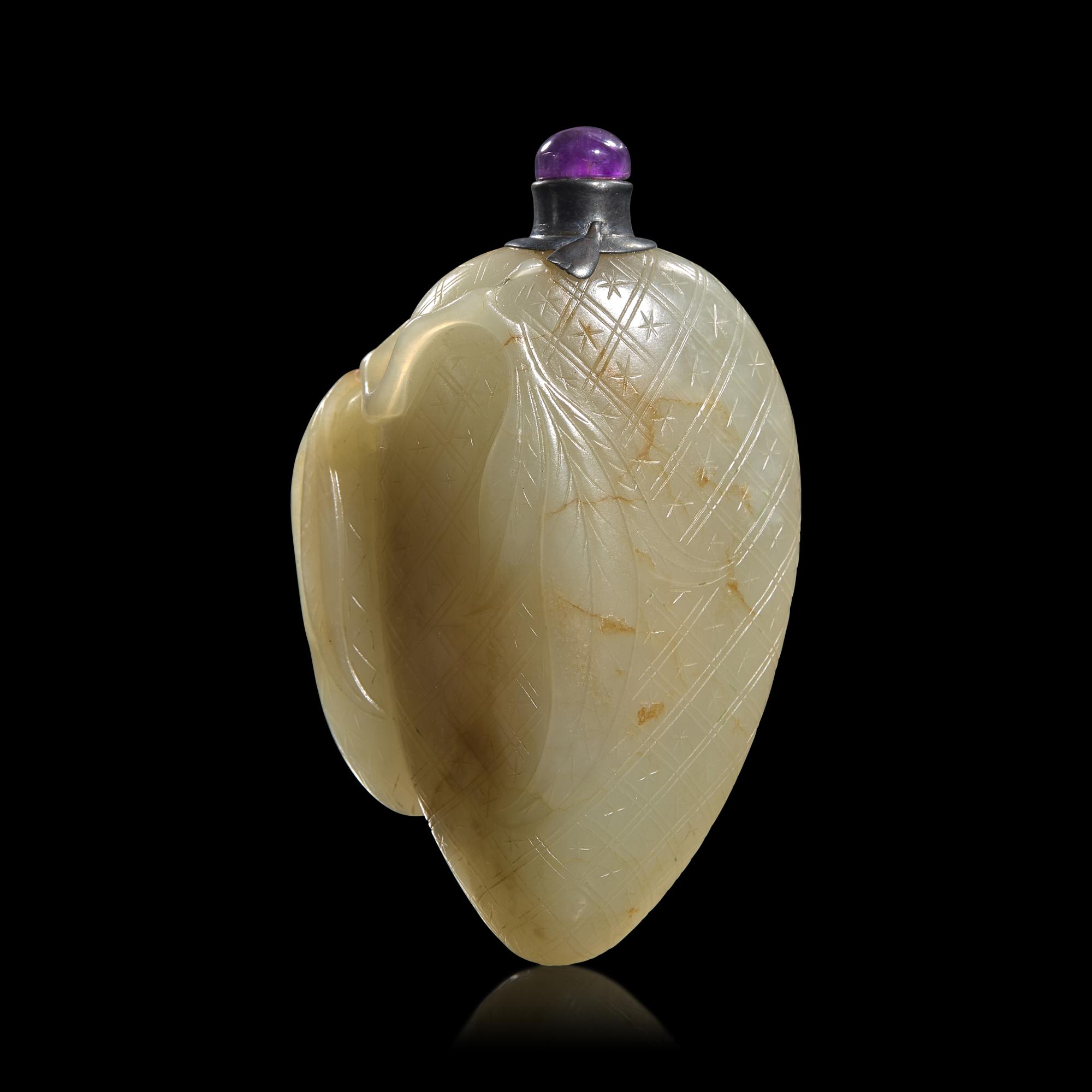 A Chinese Carved Celadon Jade "Lychee Fruit" Snuff Bottle, 18th/19th century