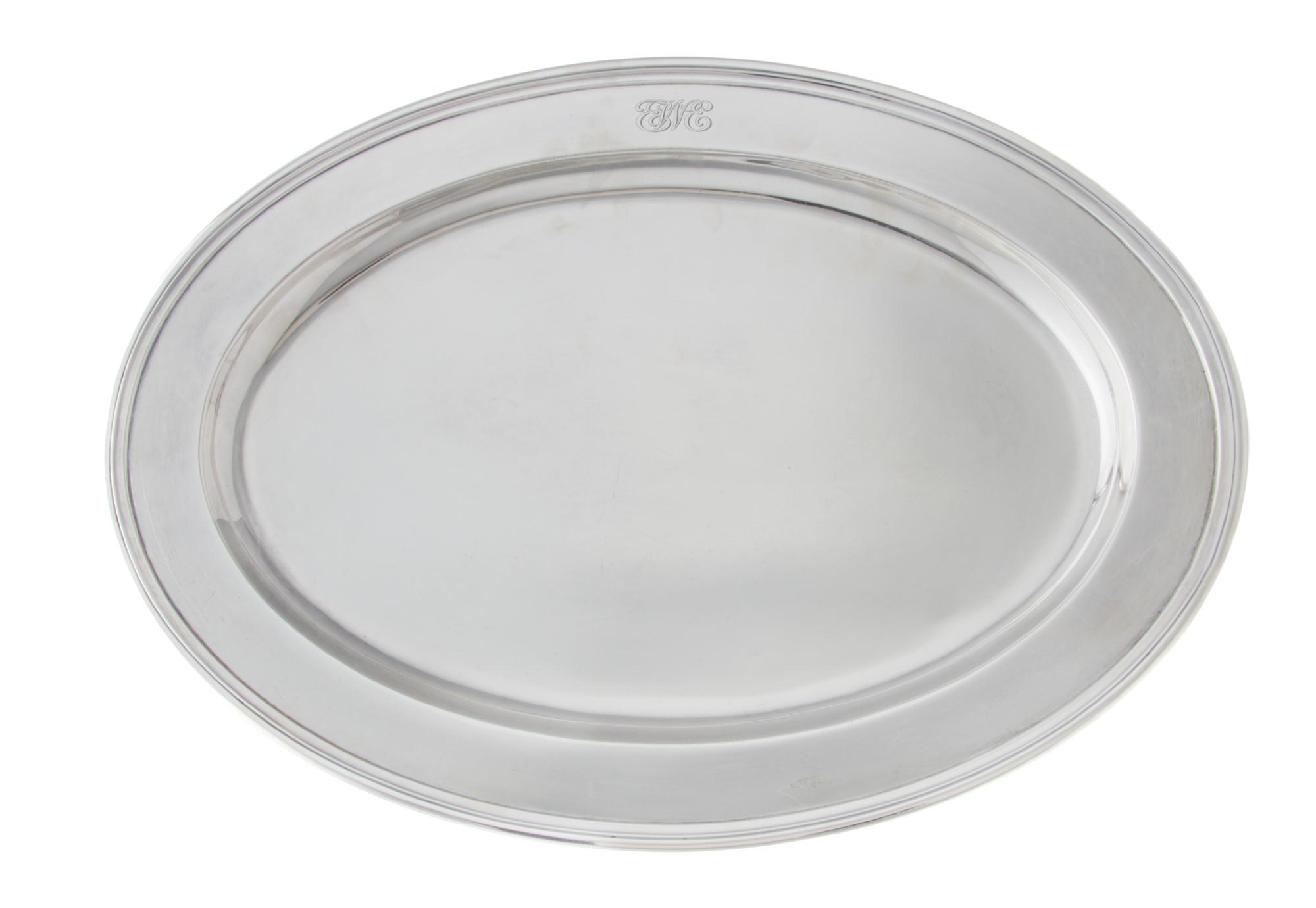 An American Silver Tray, Tiffany & Co., New York, NY, of oval form, the border with the engraved monogram EWE.