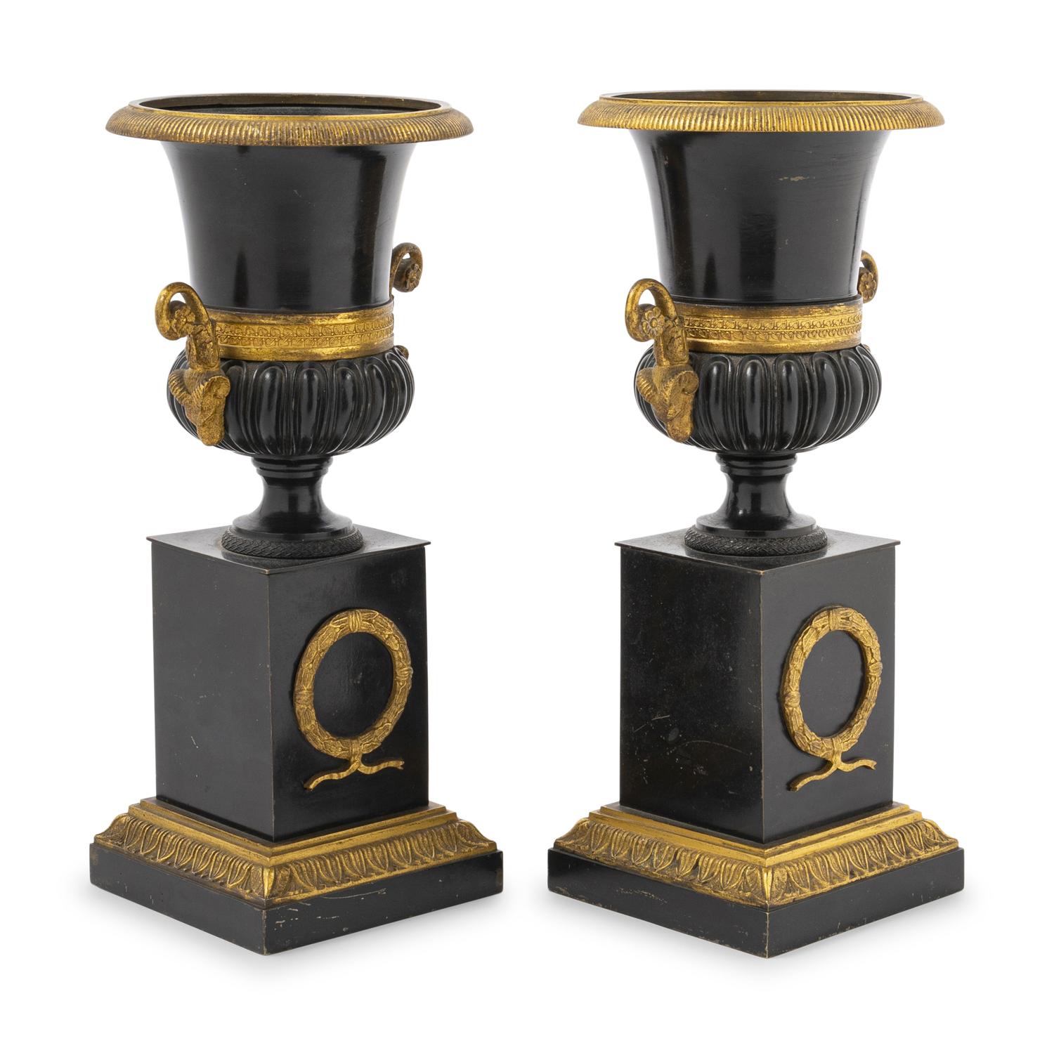 A Pair of Empire Style Gilt and Patinated Bronze Campagna Urns