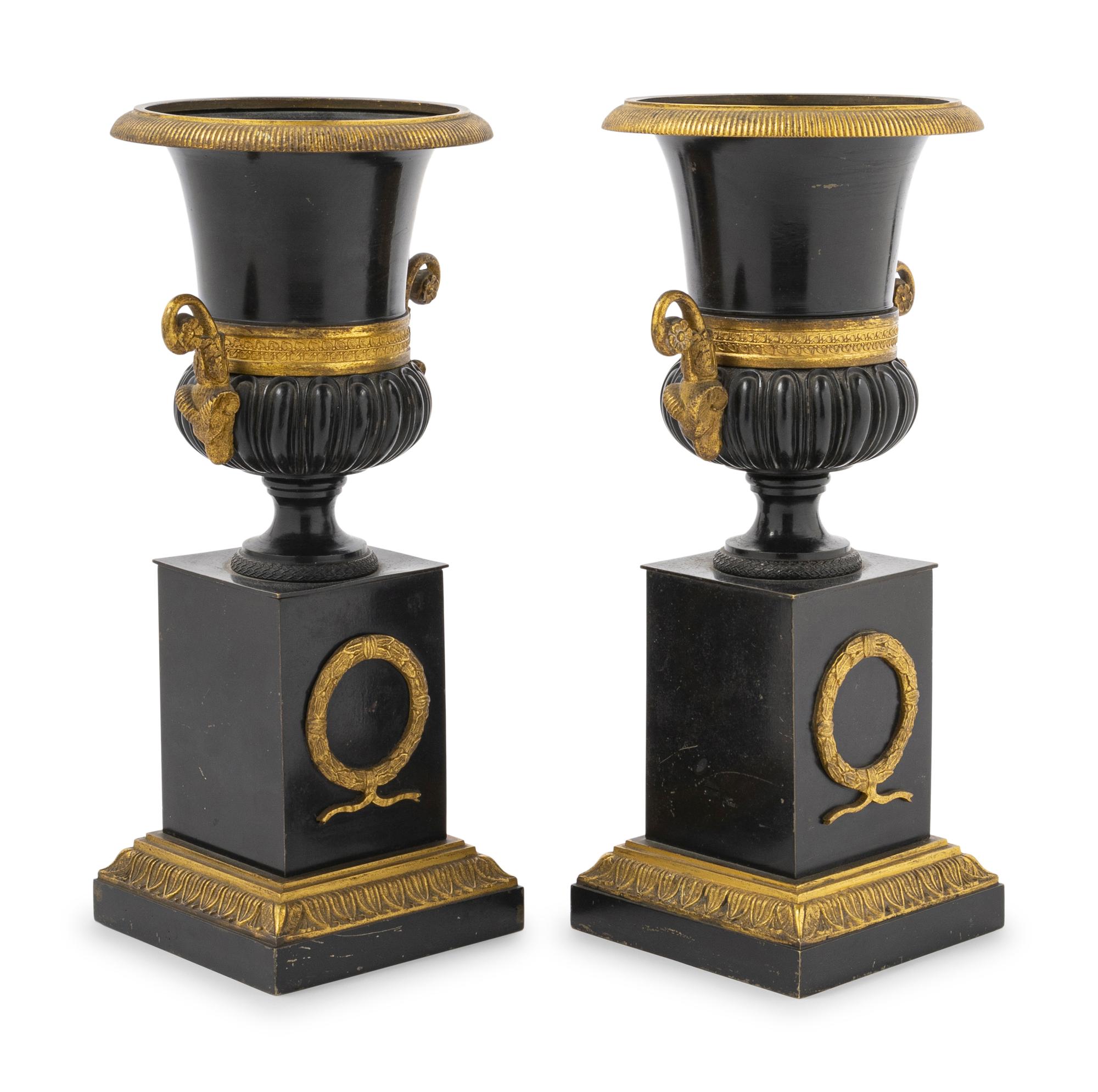 A Pair of Empire Style Gilt and Patinated Bronze Campagna Urns
