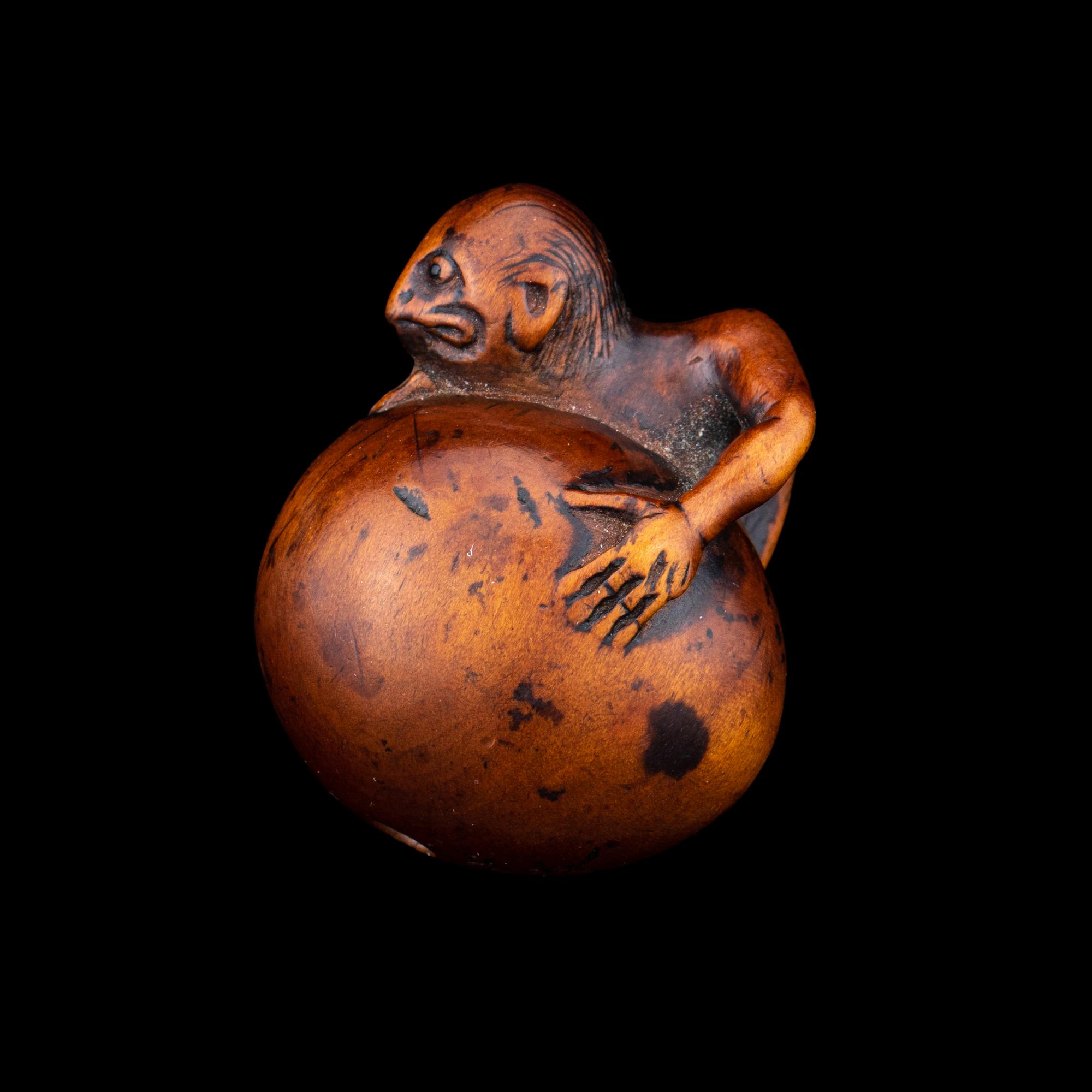 A Japanese Wood Netsuke of Hatching Tengu