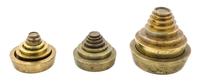 Three Sets of Stackable Brass Weights Diameter of largest weight 5 inches. — LATE 19TH/EARLY 20TH CENTURY