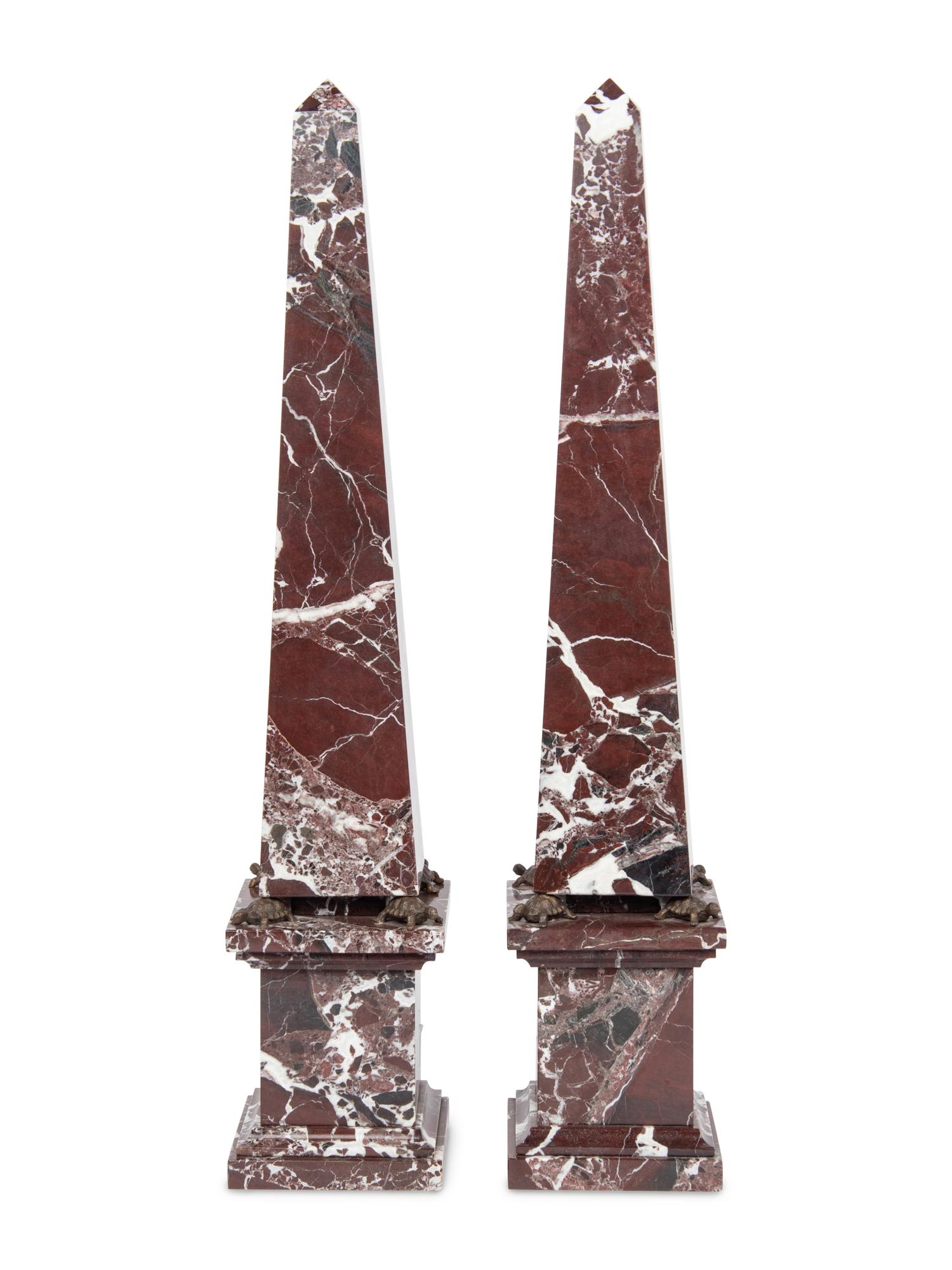 A Pair of Red Marble Obelisks