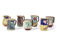 A Collection of Seven Majolica Pitchers