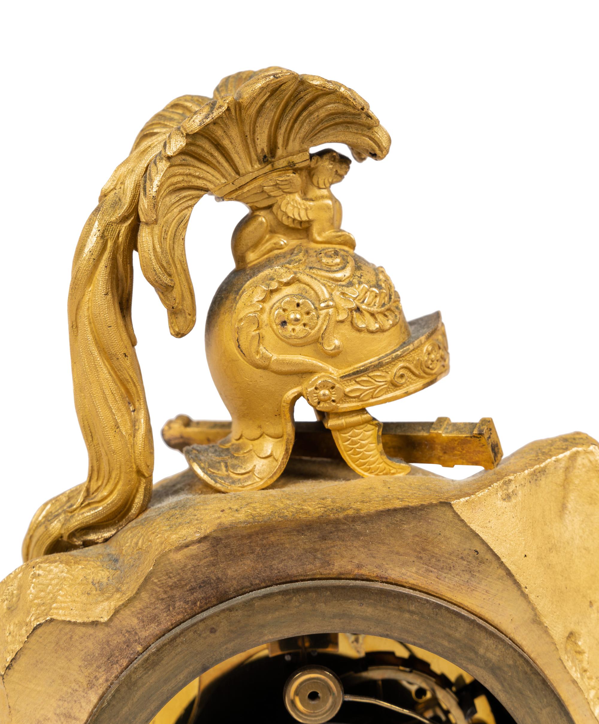 An Empire Gilt and Patinated Bronze Figural Mantel Clock