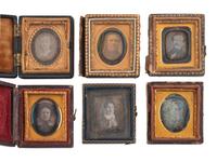 [EARLY PHOTOGRAPHY]. 74 sixteenth plate daguerreotypes of men, women, & children of varying ages.