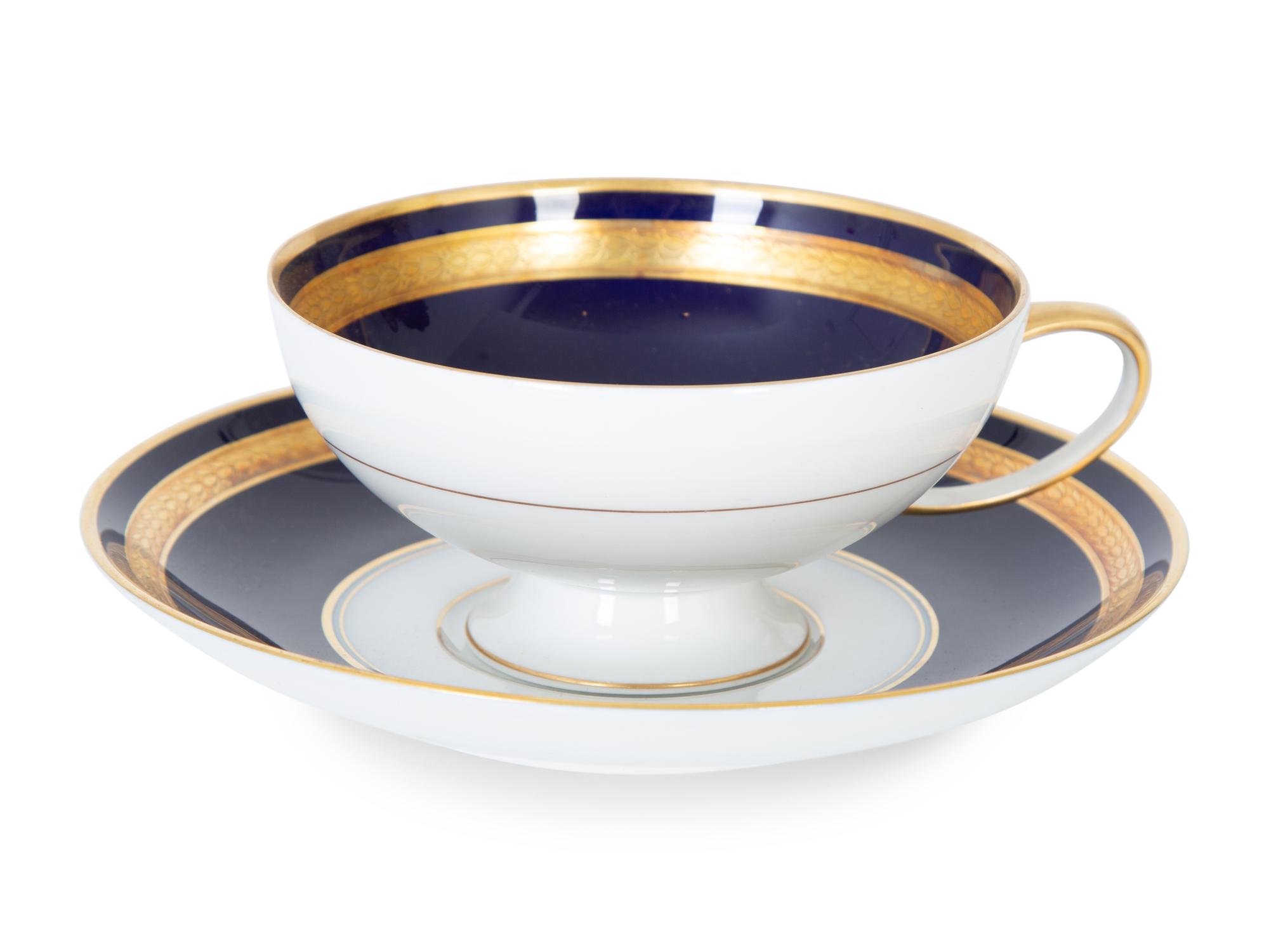 A 50-Piece Miscellaneous Group of Cobalt and Gilt Decorated Porcelain Dinnerware — 20TH CENTURY