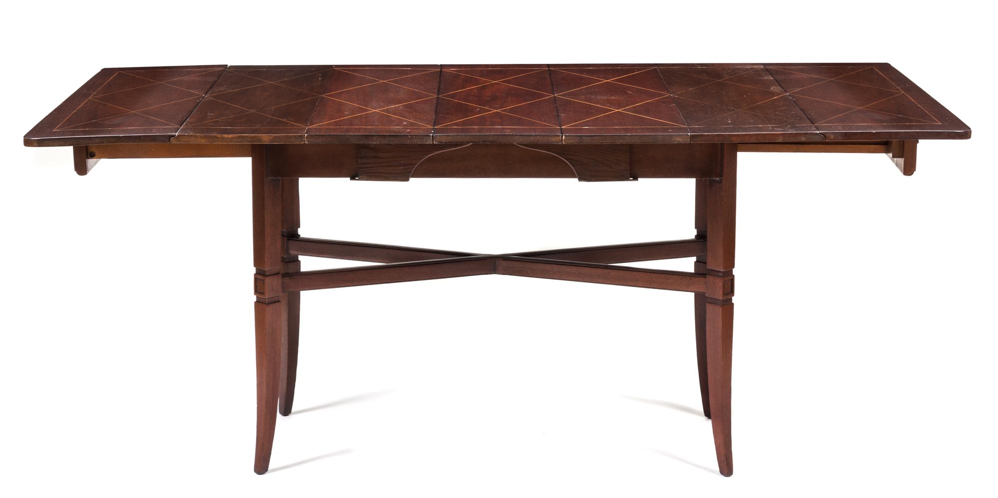 An Art Deco Style Mahogany Extension Table Height 29 1/4 x width 38 1/2 x length 69 3/8 inches. — TOMMI PARZINGER FOR CHARAK