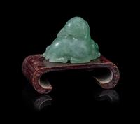 A Chinese Semi-Translucent Apple Green and Pale Celadon Jadeite 'Three Rams' Figural Group