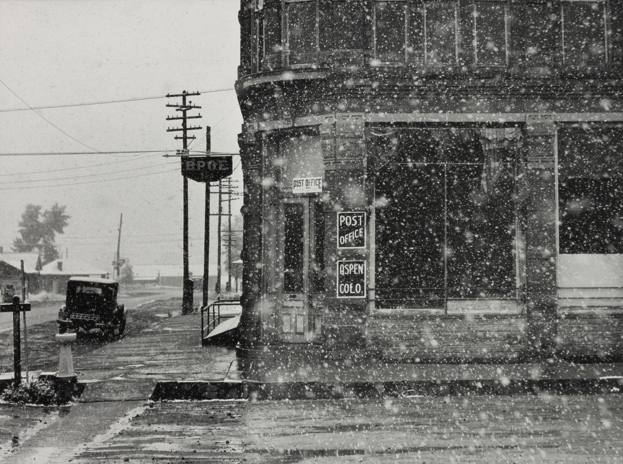 A group of five photographs ( A member of the Wilkins Family Making Biscuits , 1939; Post Office in Blizzard, Aspen, CO , 1941; Negro (Black) Man Entering Movie Theater by Colored Entrance, Belzoni, Miss., 1939; Crossroad and General Store (Mosquito Crossing) Near Greensboro, GA, 1939 (printed 1981); Recreation Evening at Community School Under Direction of WPA Recreational Supervisor (in suit and tie) Coffee County, Alabama, 1939)