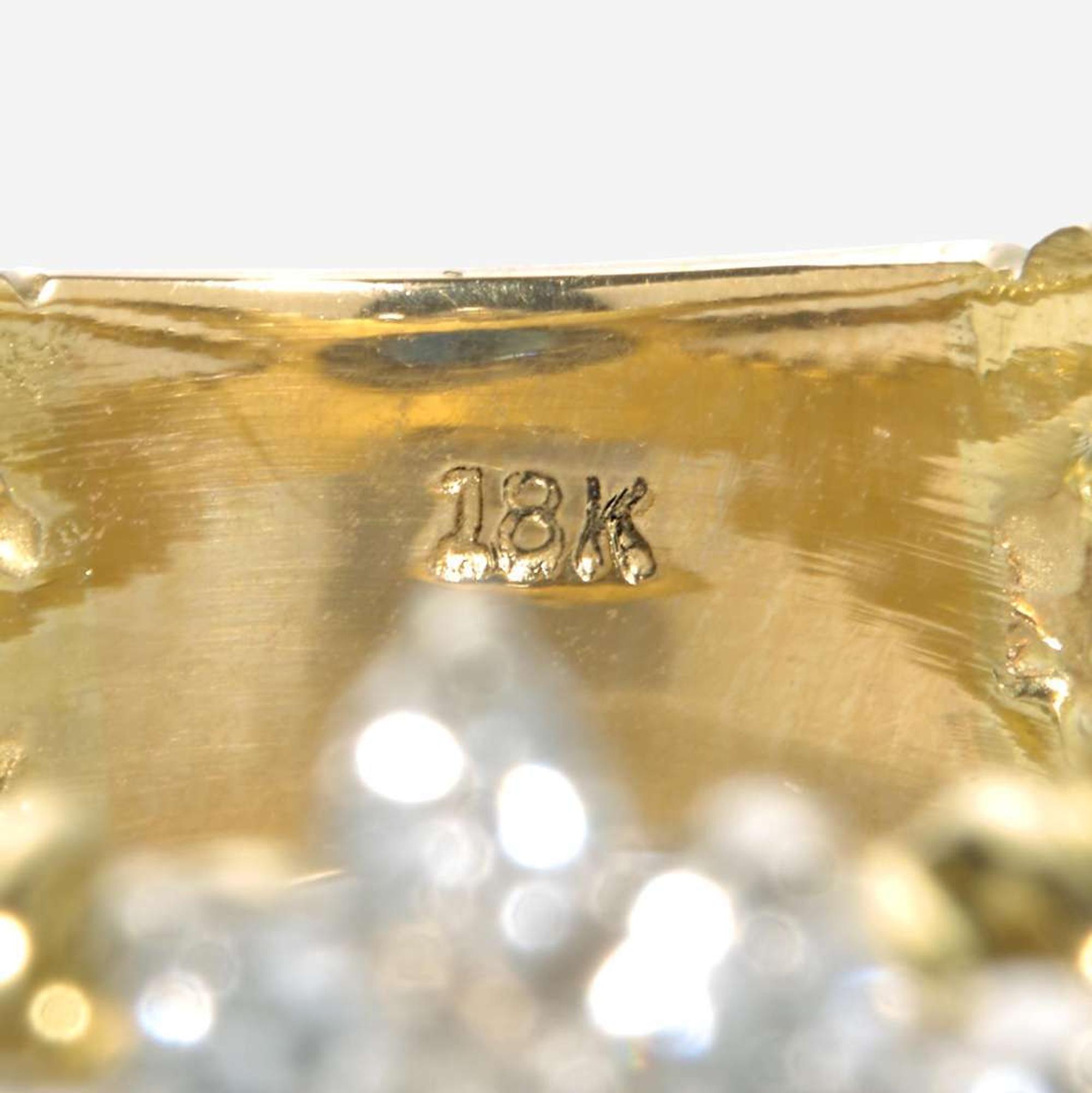 An 18K Yellow Gold, Sapphire, and Diamond Ring