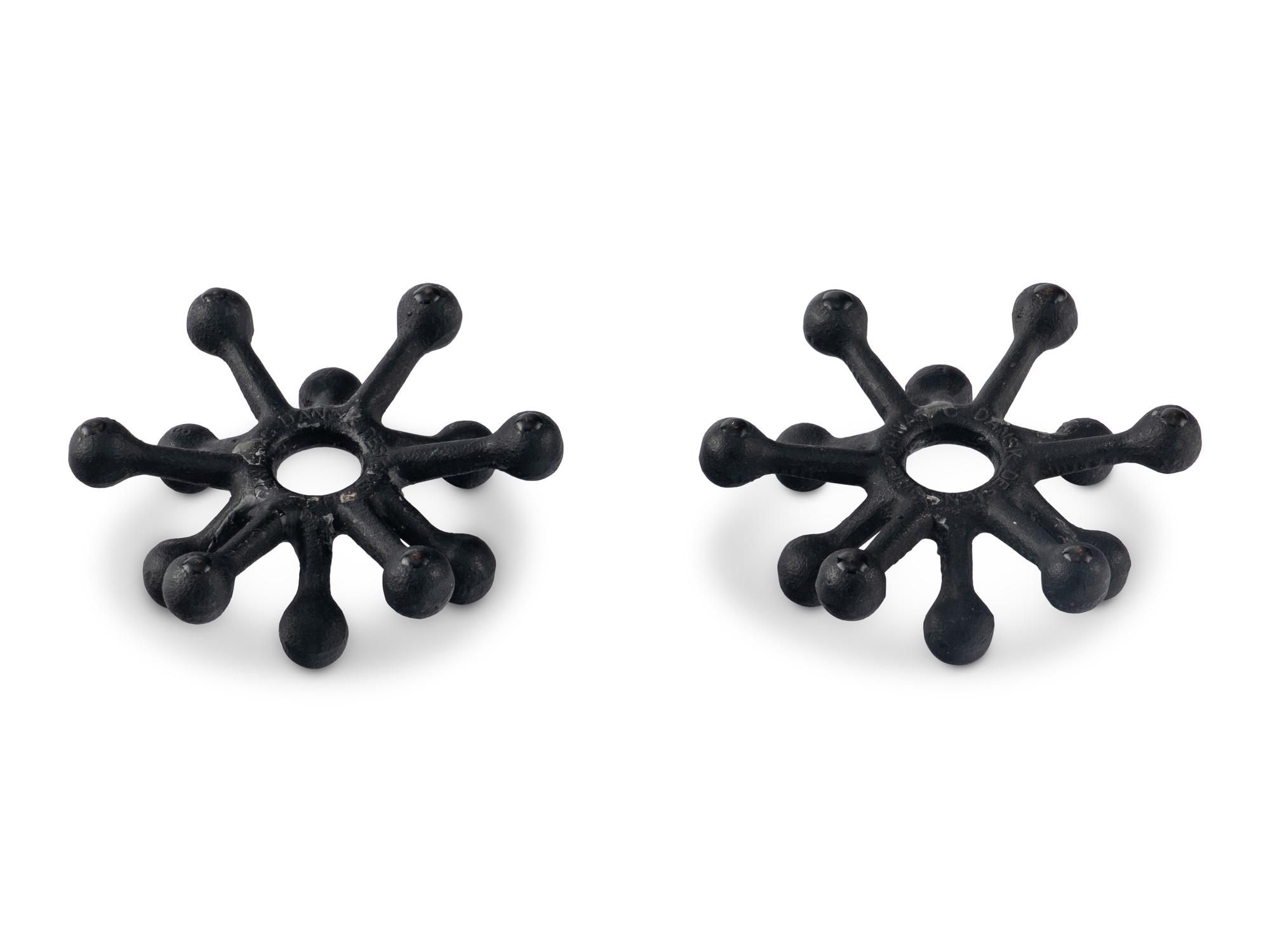 A Pair of Danish Modernist Cast Iron Candle Holders