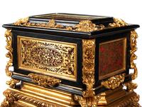 A Pair of Louis XIV Style Boulle Marquetry Caskets and Giltwood Stands