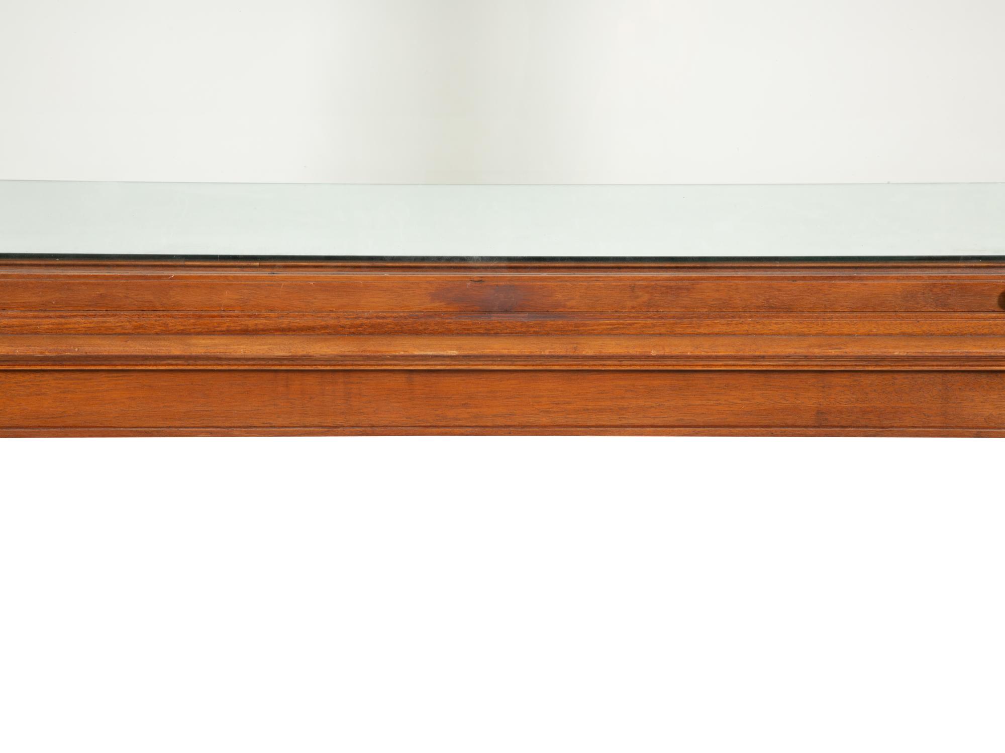 A Regency Style Mahogany Glazed Display Cabinet on Stand