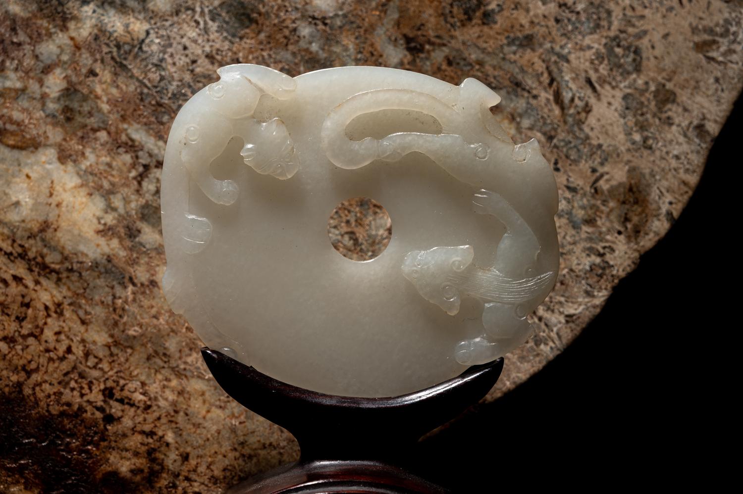 A Chinese Carved White Jade 'Chilong' Pendant and and Archaistic Jade Bi Disc