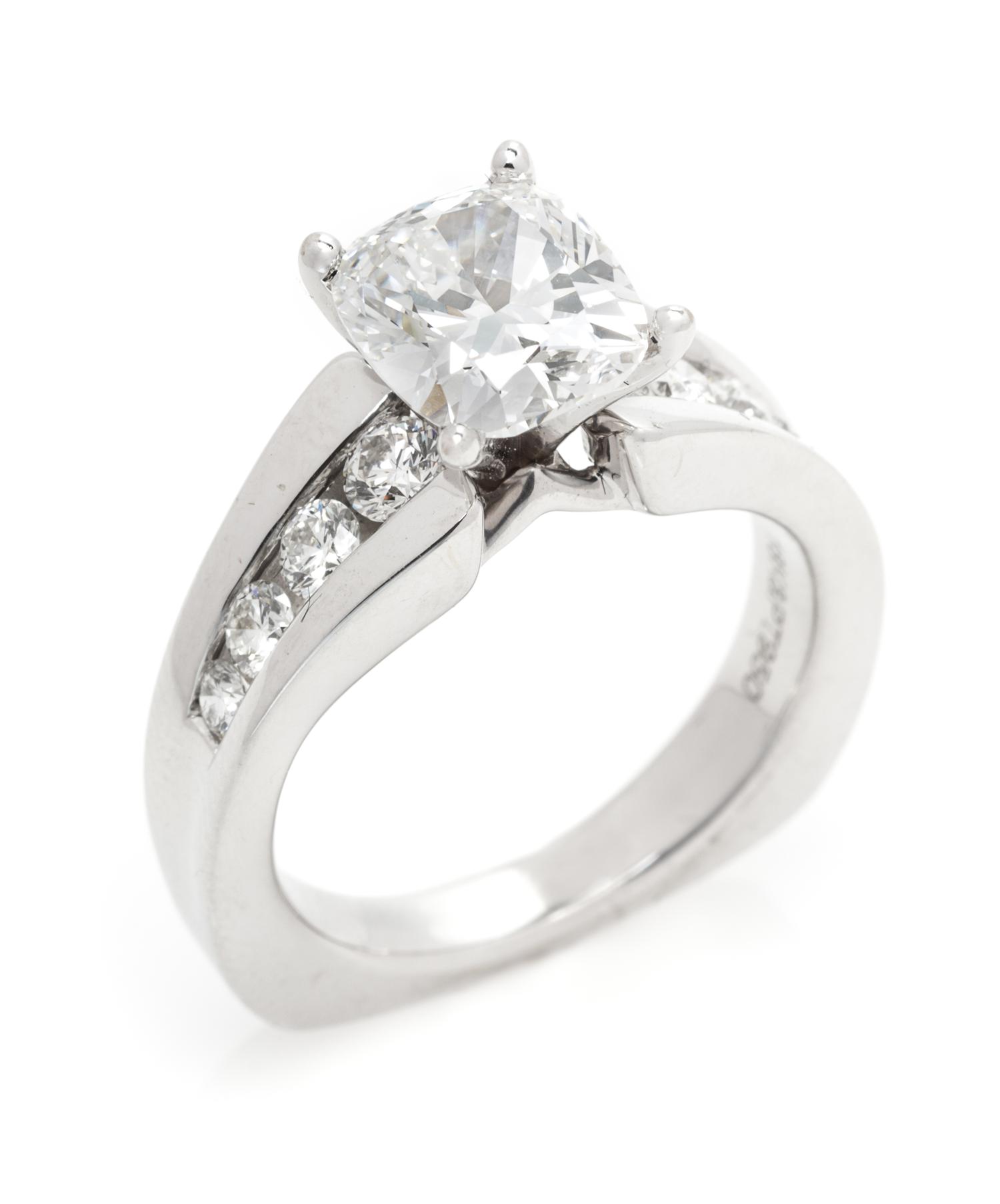 A Platinum, White Gold and Diamond Ring, 6.20 dwts.