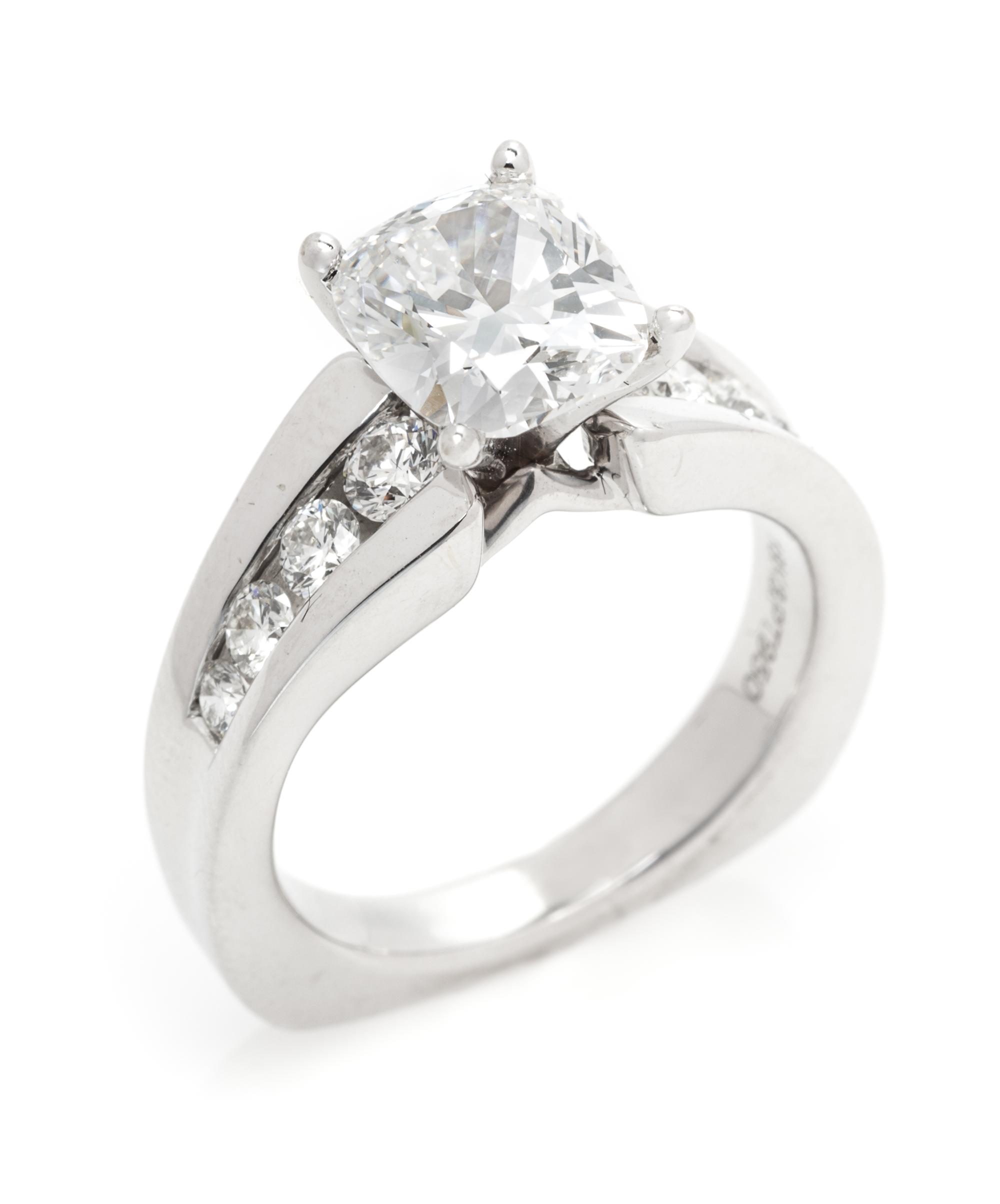 A Platinum, White Gold and Diamond Ring, 6.20 dwts.