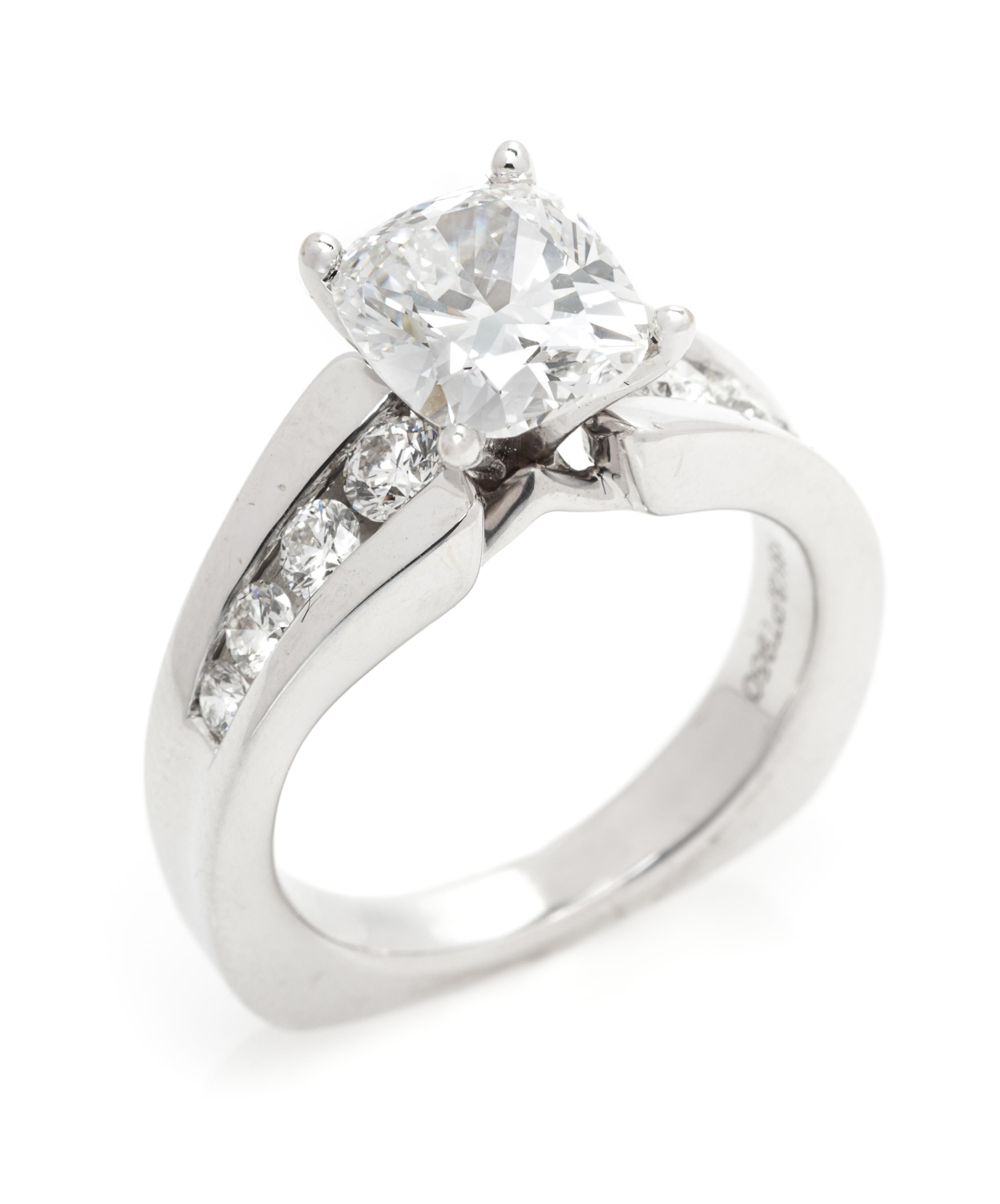 A Platinum, White Gold and Diamond Ring, 6.20 dwts.