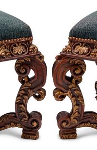 A Pair of Italian Baroque Style Carved and Parcel Gilt Benches
