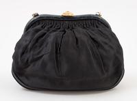 A Chanel Black Vintage Silk Evening Bag, 8" x 6" x 2".