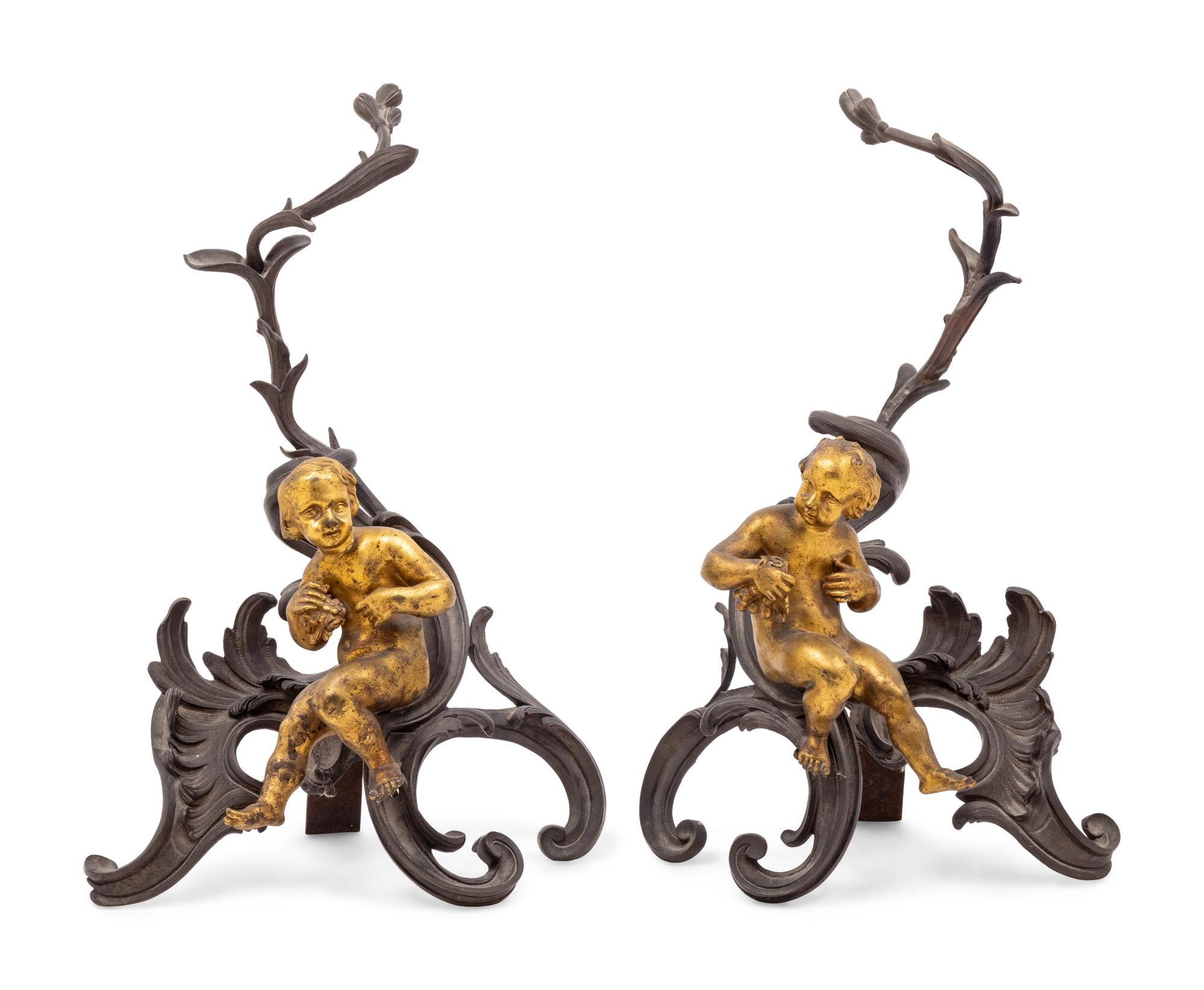 A Pair of Italian Rococo Gilt and Patinated Bronze Figural Chenets